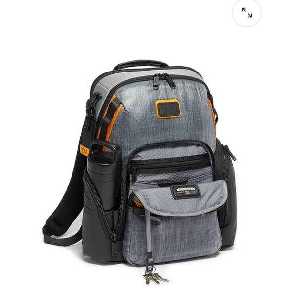 Tumi Other - 🎒 TUMI Voyage Backpack | Gray & Black with Orange Accents